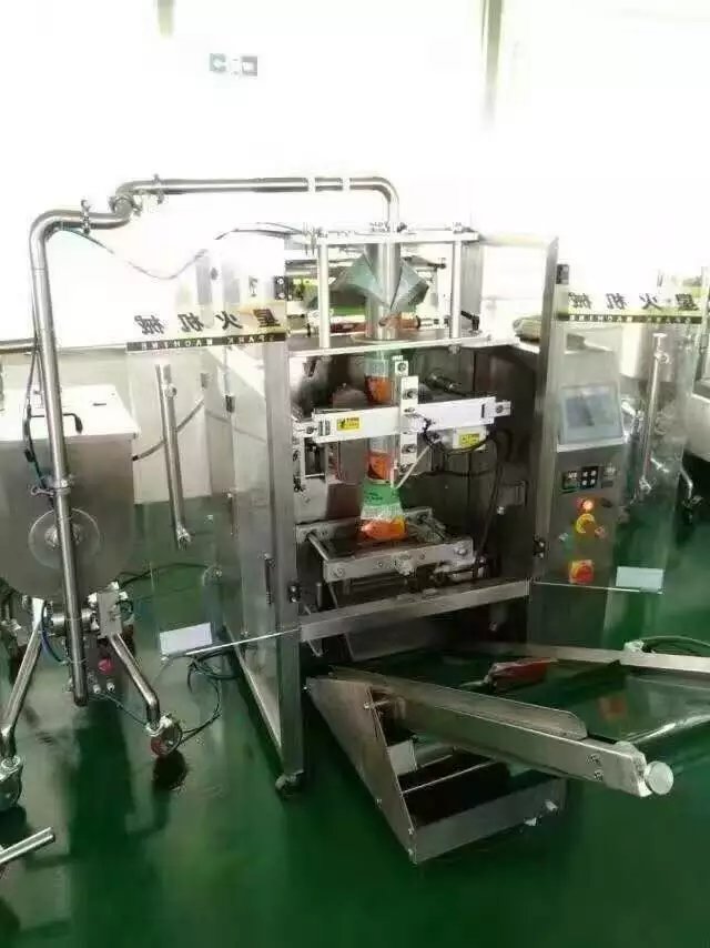 星格火鍋底料包裝機(jī)走進(jìn)熱辣壹號(hào)麻辣火鍋(圖1)